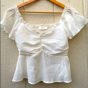 White off or on shoulder blouse